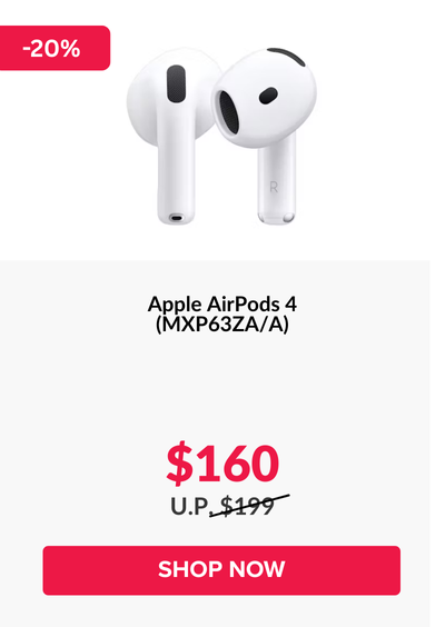 Woman wearing an olive green blazer and light blue jeans walking in an urban setting.