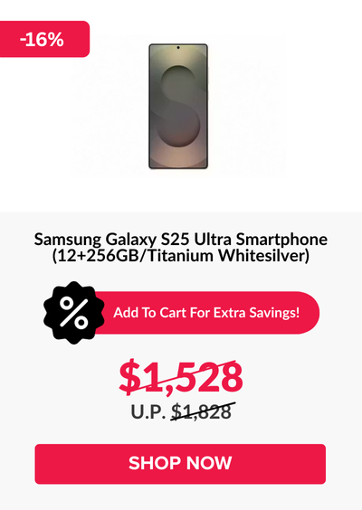 Man in a gray blazer over a dark gray shirt standing on stairs in an urban background.