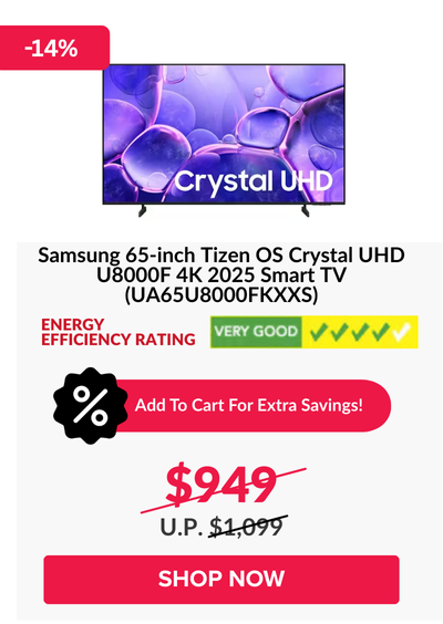 Man in a gray blazer over a dark gray shirt standing on stairs in an urban background.