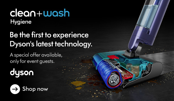 Three women enjoying a shopping day, carrying multiple colorful shopping bags while walking together outdoors.