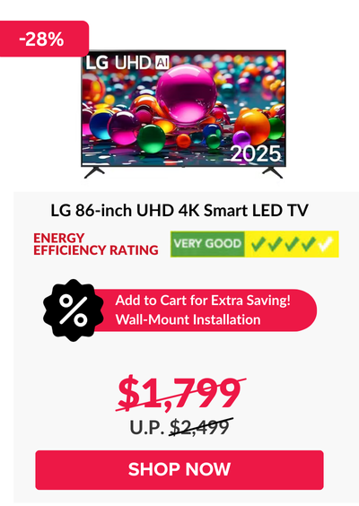 Man in a gray blazer over a dark gray shirt standing on stairs in an urban background.