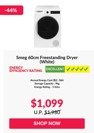 Woman wearing an olive green blazer and light blue jeans walking in an urban setting.