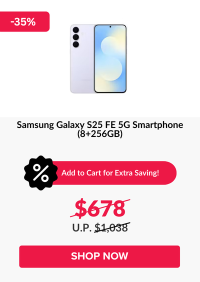 Man in a gray blazer over a dark gray shirt standing on stairs in an urban background.