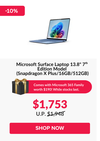 Man in a gray blazer over a dark gray shirt standing on stairs in an urban background.