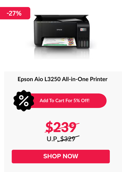 Woman wearing an olive green blazer and light blue jeans walking in an urban setting.