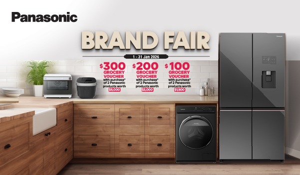 Three women enjoying a shopping day, carrying multiple colorful shopping bags while walking together outdoors.