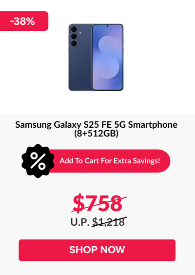 Man in a gray blazer over a dark gray shirt standing on stairs in an urban background.