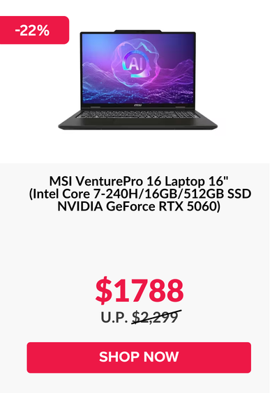 Man in a gray blazer over a dark gray shirt standing on stairs in an urban background.