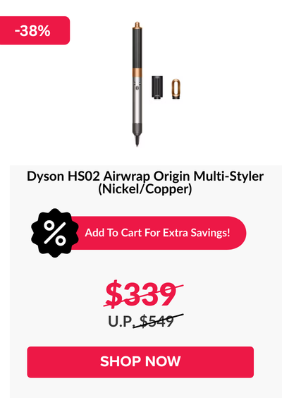 Woman wearing an olive green blazer and light blue jeans walking in an urban setting.