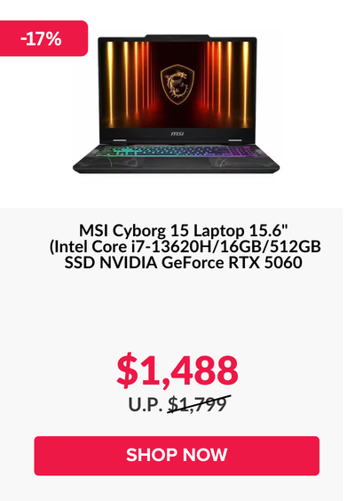 Man in a gray blazer over a dark gray shirt standing on stairs in an urban background.