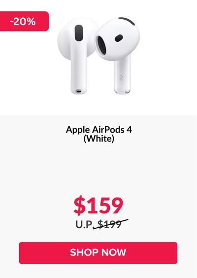 Woman wearing an olive green blazer and light blue jeans walking in an urban setting.