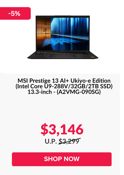 Man in a gray blazer over a dark gray shirt standing on stairs in an urban background.