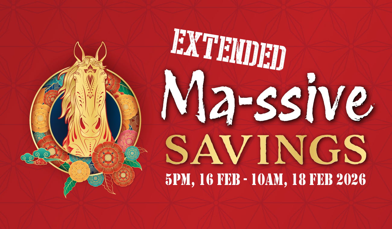 Three women enjoying a shopping day, carrying multiple colorful shopping bags while walking together outdoors.