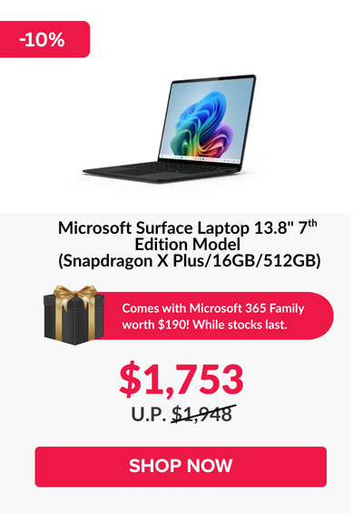 Man in a gray blazer over a dark gray shirt standing on stairs in an urban background.