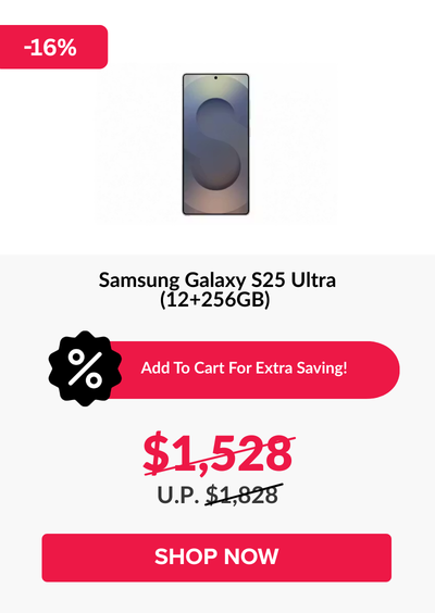 Man in a gray blazer over a dark gray shirt standing on stairs in an urban background.