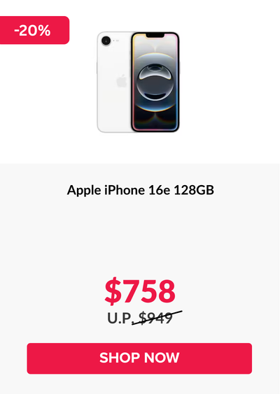 Woman wearing an olive green blazer and light blue jeans walking in an urban setting.