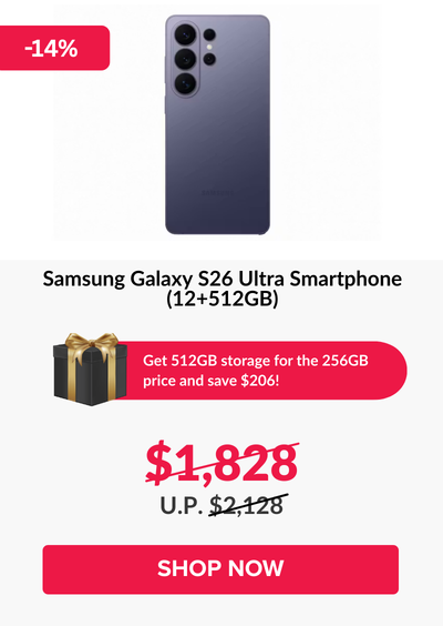 Man in a gray blazer over a dark gray shirt standing on stairs in an urban background.