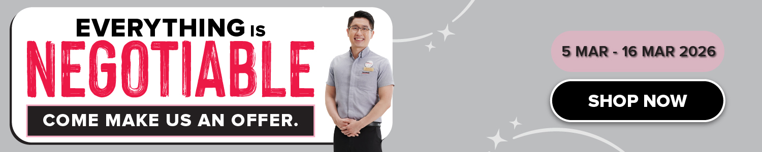Three women enjoying a shopping day, carrying multiple colorful shopping bags while walking together outdoors.
