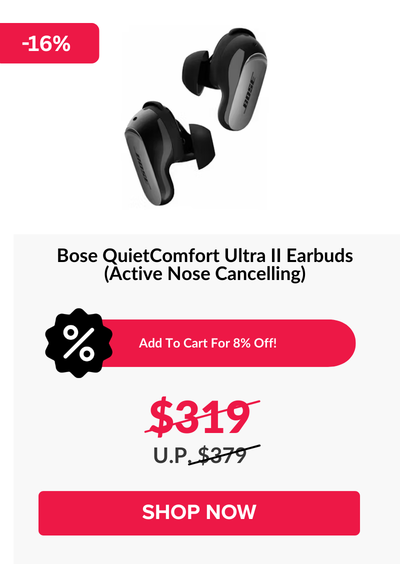 Woman wearing an olive green blazer and light blue jeans walking in an urban setting.