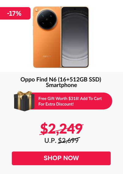 Man in a gray blazer over a dark gray shirt standing on stairs in an urban background.