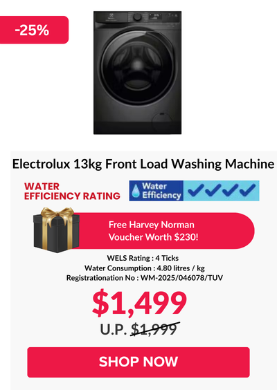 Woman wearing an olive green blazer and light blue jeans walking in an urban setting.