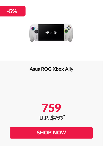 Woman wearing an olive green blazer and light blue jeans walking in an urban setting.