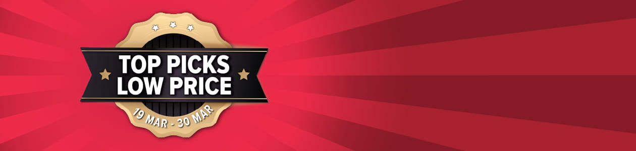 Three women enjoying a shopping day, carrying multiple colorful shopping bags while walking together outdoors.