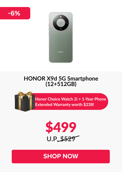 Man in a gray blazer over a dark gray shirt standing on stairs in an urban background.