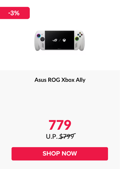 Woman wearing an olive green blazer and light blue jeans walking in an urban setting.