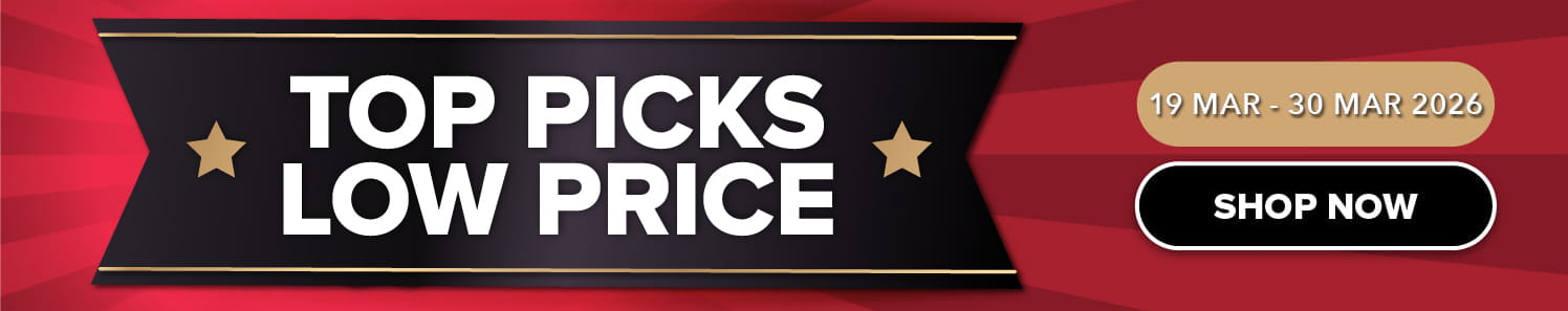 Three women enjoying a shopping day, carrying multiple colorful shopping bags while walking together outdoors.