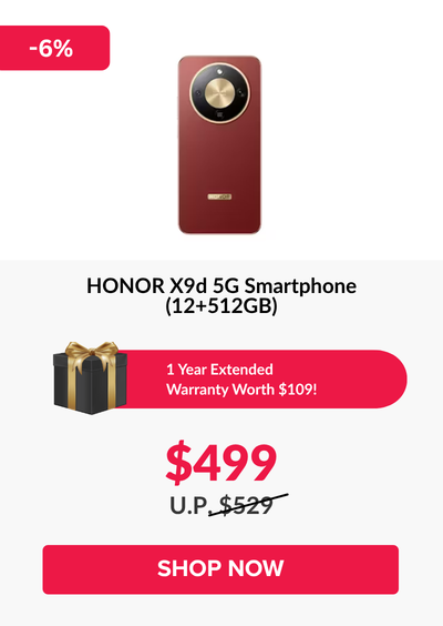 Man in a gray blazer over a dark gray shirt standing on stairs in an urban background.