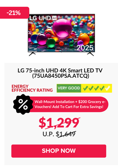 Man in a gray blazer over a dark gray shirt standing on stairs in an urban background.