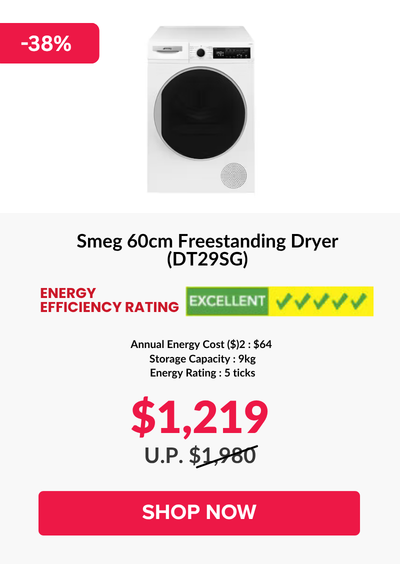 Woman wearing an olive green blazer and light blue jeans walking in an urban setting.