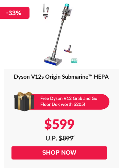 Woman wearing an olive green blazer and light blue jeans walking in an urban setting.