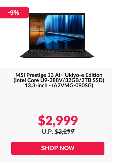 Man in a gray blazer over a dark gray shirt standing on stairs in an urban background.