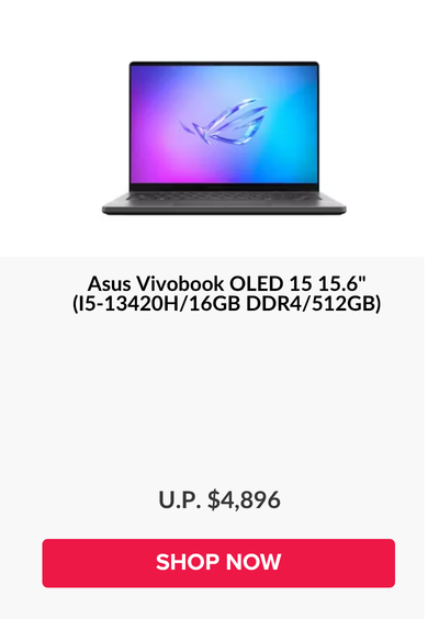 Man in a gray blazer over a dark gray shirt standing on stairs in an urban background.