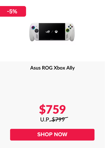 Woman wearing an olive green blazer and light blue jeans walking in an urban setting.