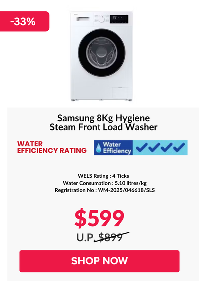 Woman wearing an olive green blazer and light blue jeans walking in an urban setting.