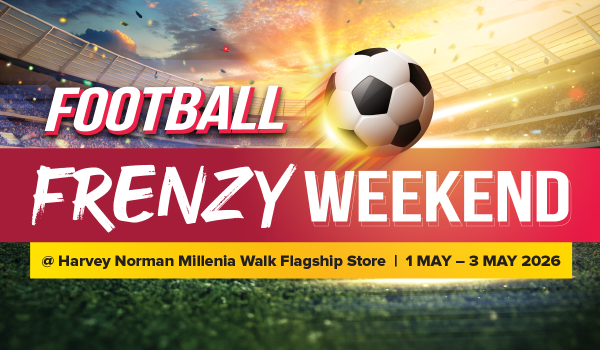 Three women enjoying a shopping day, carrying multiple colorful shopping bags while walking together outdoors.