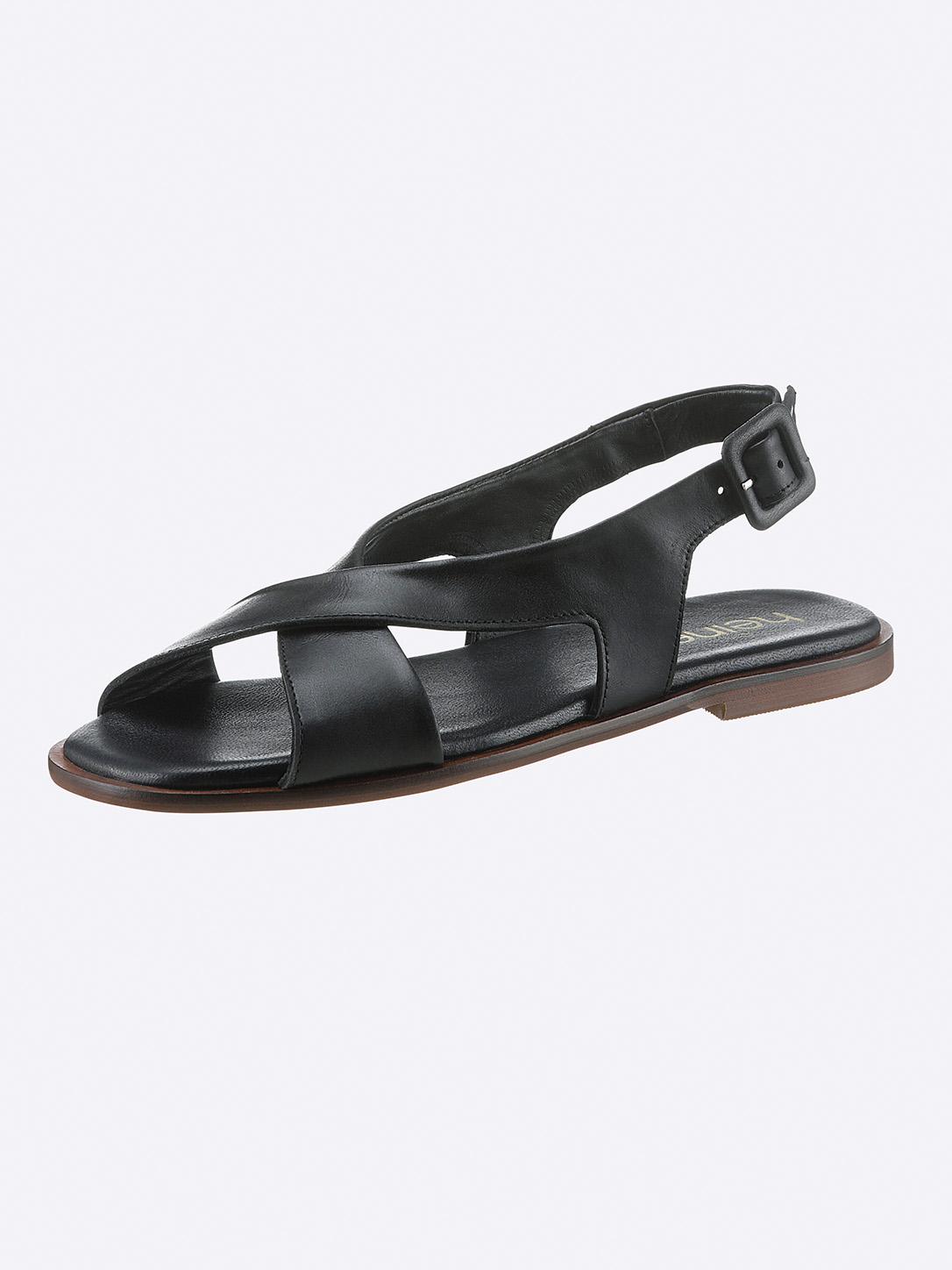 Schwarze flache Sandale mit gekreuzten Riemen und verstellbarem Knöchelriemen.