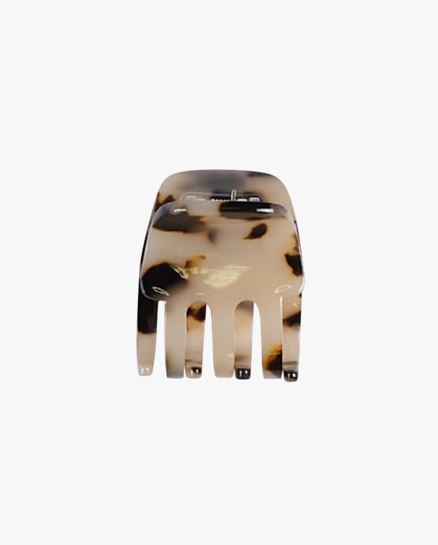 Lila hiusklipsi vaaleanruskea