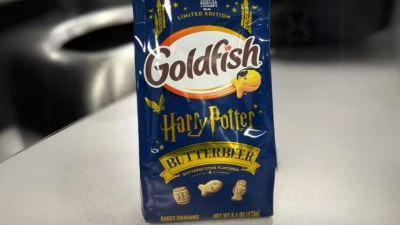 Dark blue bag with Goldfish brand snacks flavored like butterbeer