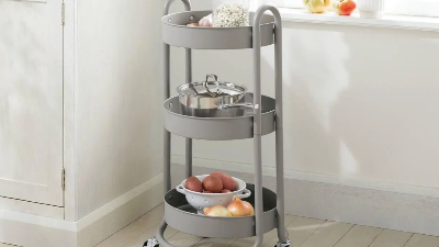 Three Tier Round storage cart with containers of pens and other stationary