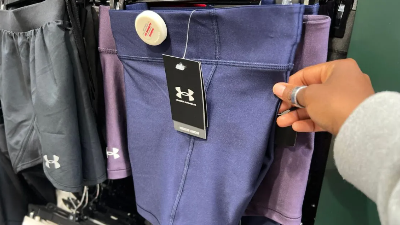 Under Armour shorts on a rack