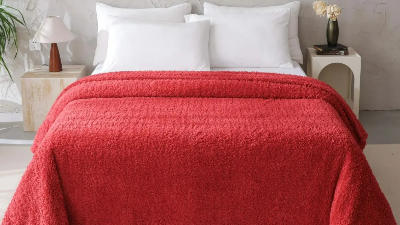 bed with red comforter