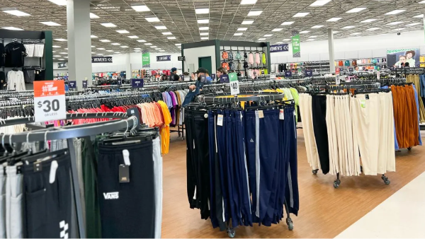department store rack with joggers, sweatshirts, and more