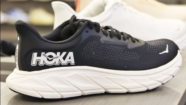 one black and white Hoka running shoe