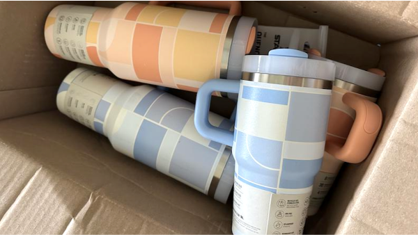 assorted stanley tumblers in a box