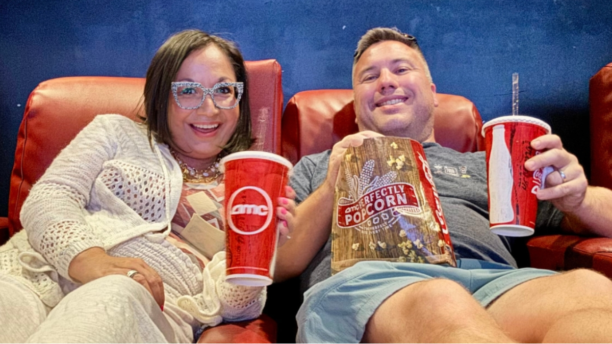 two people at a movie theatre