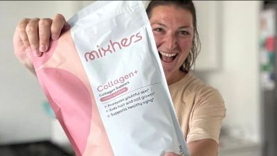 woman holding up mixhers package